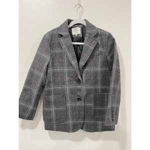 May include: A gray plaid blazer with a single button closure and two pockets. The blazer has a subtle orange and white plaid pattern.