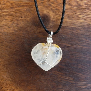 Golden healer heart pendant