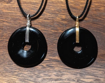 Obsidian pi stone pendant