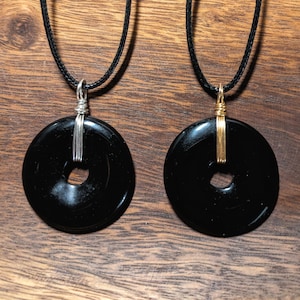 Obsidian pi stone pendant