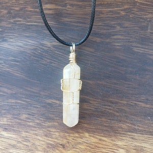 Golden healer point pendant
