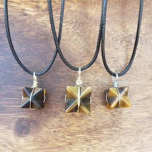 Colgante merkaba ojo de tigre