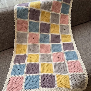 Handmade Crochet Baby Blanket: Colorful Patchwork Nursery Throw