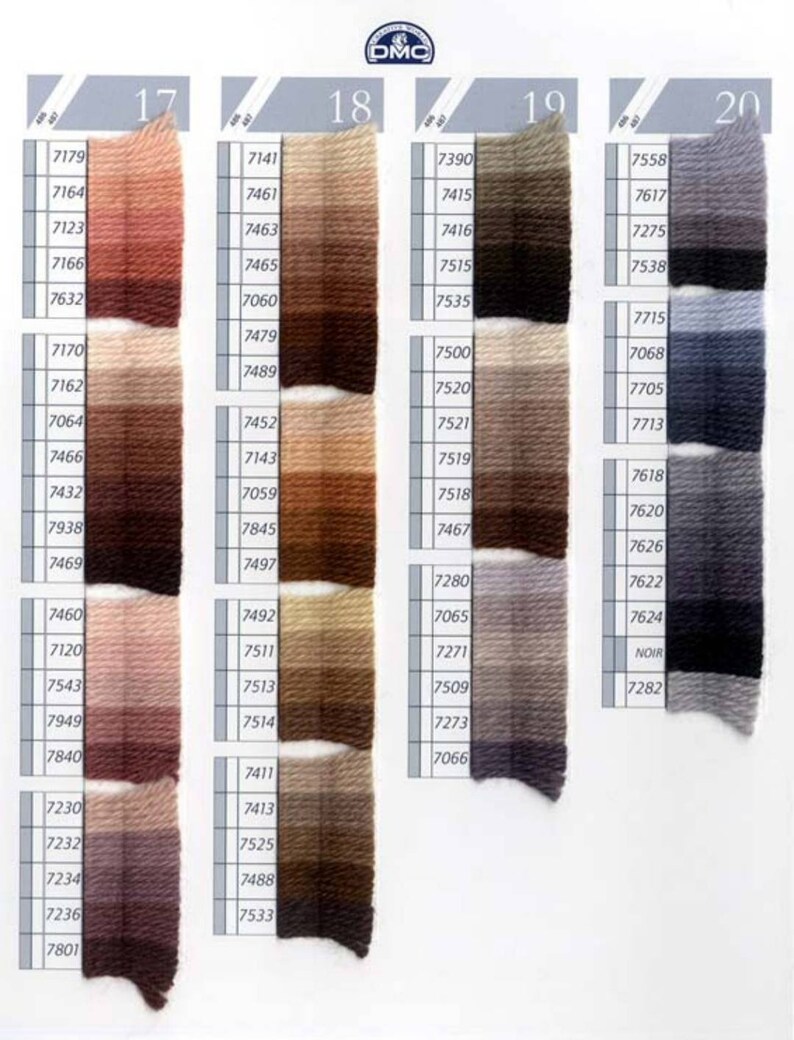 Peut inclure: Un nuancier de fils &agrave; broder DMC avec des num&eacute;ros et des couleurs correspondantes. Le nuancier comprend des nuances de brun, beige, gris et bleu.