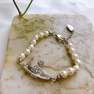 18K White Gold Saturn Bracelet, Mini Bas Relief Bracelet