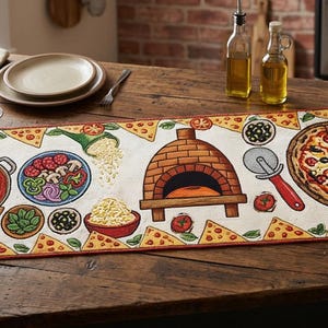 May include: An off-white rectangular table runner with a pizza theme. It features illustrations of pizza ingredients, a brick oven, and a complete pizza. The border is decorated with pizza slices. The runner is on a wooden table.