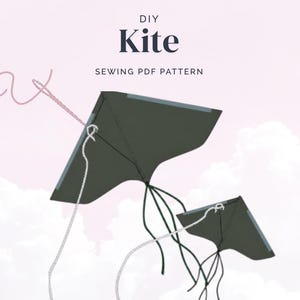 May include: A DIY kite sewing PDF pattern is displayed against a soft pink background with a cloud-like design. The image features two dark green kites with white string and the text "DIY Kite" and "SEWING PDF PATTERN".