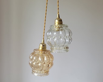 Duo of vintage pendant lights in amber molded glass 1960s