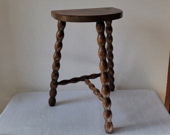 French country wooden stool milkman brutalist vintage France farm rustic turned wood tripode half moon