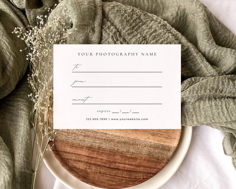 May include: A white gift certificate for photography services. The certificate has blank lines for the recipient's name, the sender's name, and the amount. It also has a line for the expiration date and contact information for the photography business.