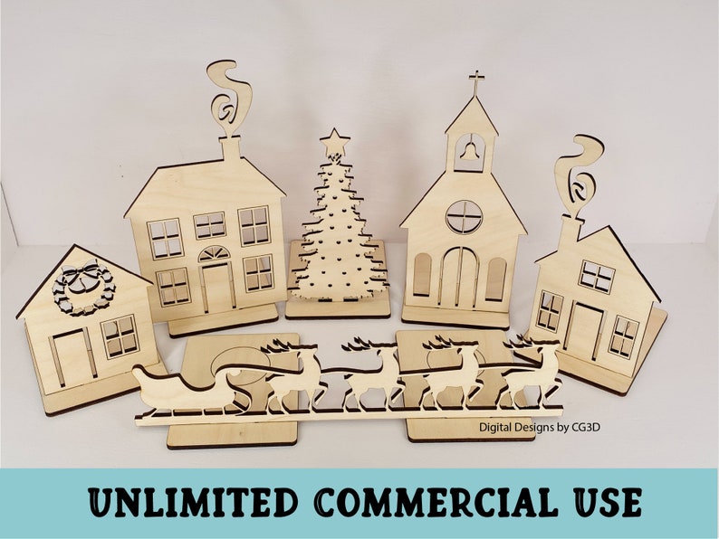 May include: A set of laser cut wooden Christmas village ornaments, including a church, houses, a Christmas tree, and a sleigh with reindeer. The ornaments are unfinished and ready to be painted or stained.  "Digital Designs by CG3D" is printed on the base of the sleigh.