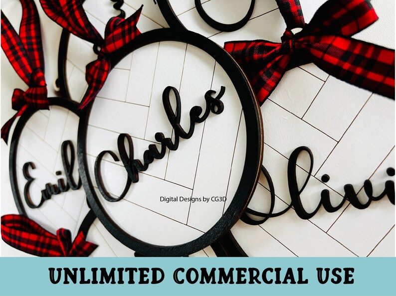 May include: Black wooden name signs with a circular frame and red and black plaid ribbon bows. The names "Emil", "Charles", and "Olivia" are displayed in a cursive font against a white background with a diagonal pattern. The text "UNLIMITED COMMERCIAL USE" is at the bottom.