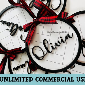 May include: Circular wooden ornaments with names cut out in a cursive font. The ornaments have a black border, a white and gray background, and are adorned with red and black plaid ribbons. The text "UNLIMITED COMMERCIAL USE" is at the bottom.