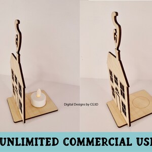 May include: Wooden house-shaped candle holder with a smoke plume on top. The holder has a cutout design of a house with windows and a door. A small white tea light candle sits on a separate platform.
