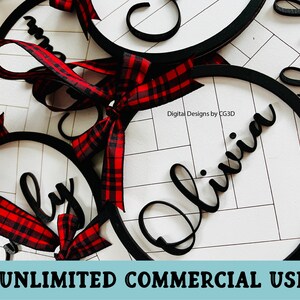 May include: Circular wooden ornaments with names in a cursive font, accented with black trim and red and black plaid ribbons. The background is white with a wood grain pattern. Text on the image reads "Digital Designs by CG3D" and "UNLIMITED COMMERCIAL USE".
