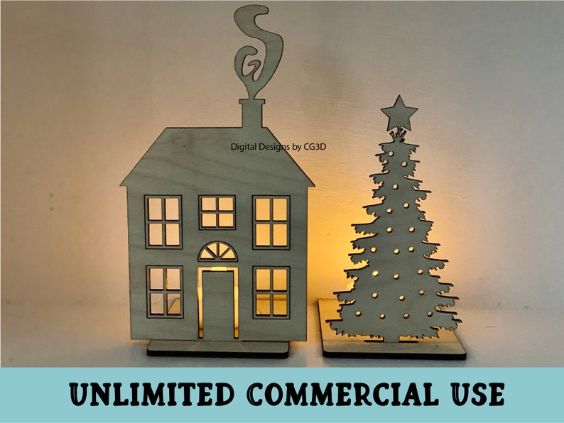 May include: A wooden cutout of a house with a chimney and a star-topped Christmas tree. The house has windows and a door. The tree has a star on top and is decorated with circles. The text "Digital Designs by CG3D" is visible on the house. The text "UNLIMITED COMMERCIAL USE" is visible at the bottom of the image.