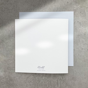 May include: Blank white card with a light gray envelope. The card has the text "Kleancut Paperie" and "Old Hart - 0000 00" printed on the bottom.