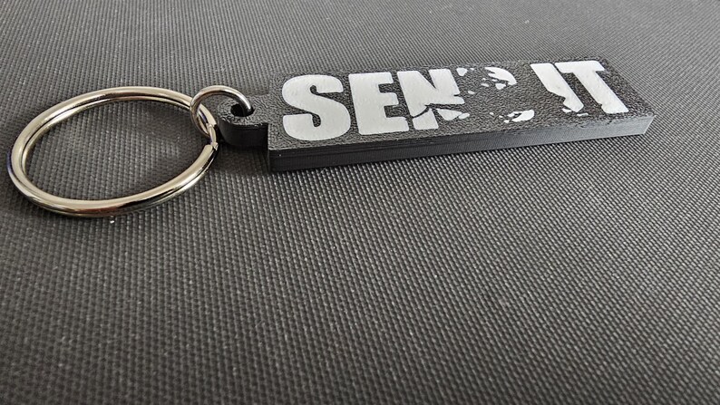 May include: A rustic wooden sign with the text "Welcome to our home" in white lettering. The sign features a distressed finish and a simple, inviting design, perfect for entryway decor.