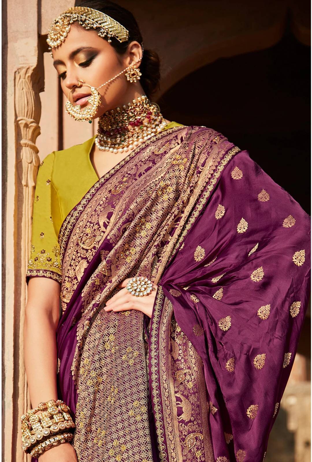 golden blouse with purple saree