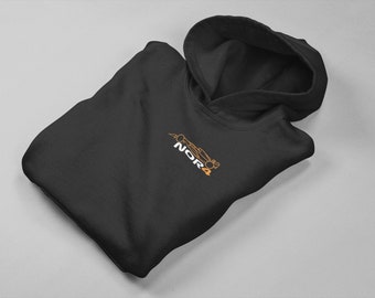May include: Black hooded sweatshirt with a white and orange graphic of a race car and the text "NSR4".