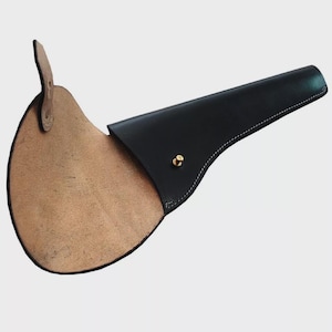 May include: A black leather sheath with a tan interior. The sheath has a curved shape with a flap and a brass-coloured stud closure. White stitching accents the edges.