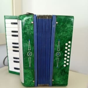 Children&#39;s old accordion Musical vintage instrument Harmony antique