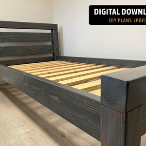 May include: A set of three ceramic nesting bowls in graduating sizes. The bowls are white with a speckled, textured finish and feature a slightly flared rim. The largest bowl measures approximately 8 inches in diameter.