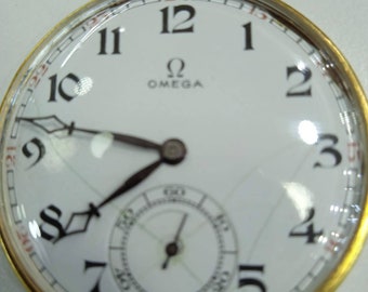 Omega pocket watch .14k Gold Plated.Solid Silver case.