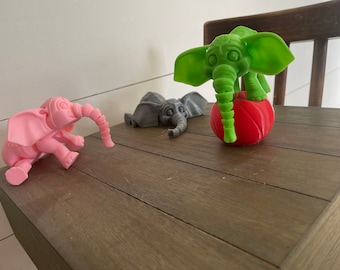 Flexible elephant includes small balance ball