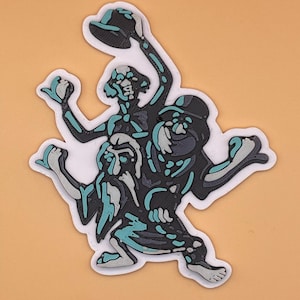 Peut inclure: Un autocollant représentant une illustration stylisée de trois personnages en noir, gris et sarcelle. Les personnages sont dans une pose dynamique, avec les bras levés et des chapeaux. L'autocollant a une bordure blanche et est sur un fond pêche.