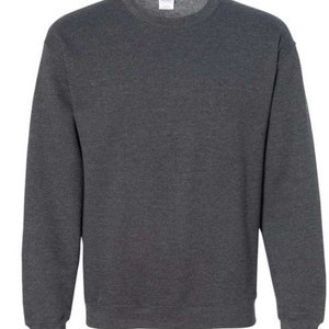May include: A dark gray sweatshirt with long sleeves and a crew neck.