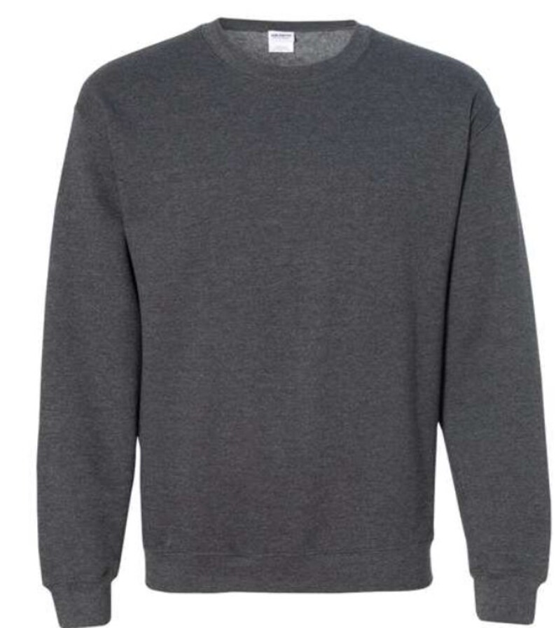 May include: A dark gray sweatshirt with long sleeves and a crew neck.