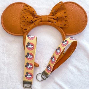 Disney themed faux leather key fob, annual passholder keychain, Park snacks, haunted mansion, Epcot ball