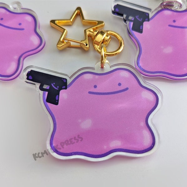 Ditto with gun acrylic charm