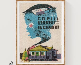 May include: A framed art print featuring a blue silhouette of a child's head with a matchbox on top. The text reads COPIL + CHIBRIT = INCENDIU. Below the head is a house with a yellow roof and a small haystack, all rendered in a textured, vintage style.