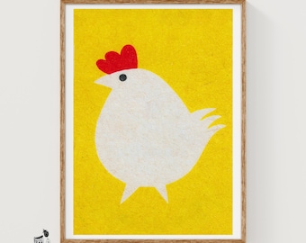 May include: A framed wall art print featuring a stylized white chicken with a bright red comb and a single black dot for an eye, set against a solid, textured yellow background. The artwork is enclosed in a simple, light brown wooden frame.