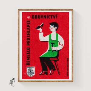 May include: A rectangular print on a red background featuring a graphic illustration of a person in a green apron holding a black shoe and a hammer. The text OBUVNICTVI and REMESLO PRO CHLAPCE is printed in black, with a small emblem at the bottom.