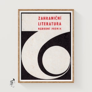 May include: Framed vintage print with a black and white graphic design. The print features a large white number six shape against a black background. The top of the print has red text that reads "Zahraniční Literatura Národní Podnik".