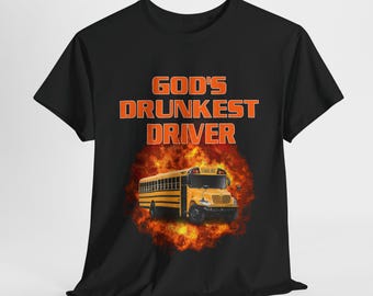 May include: Black t-shirt with orange text that reads "God's Drunkest Driver". A yellow school bus with flames behind it is printed on the shirt.
