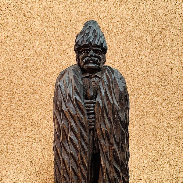 Vintage hand-carved wood warrior with sword figurine Size: 2.5" wide x 8" tall tabletop