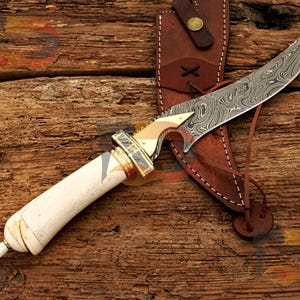 Handmade Damascus Steel Hunting Knife: Carved Camel Bone Handle, Leather Sheath