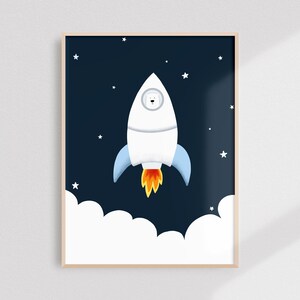 May include: A white polar bear wearing a spacesuit flies in a rocket ship against a dark blue background with white stars. The rocket has blue fins and orange flames.