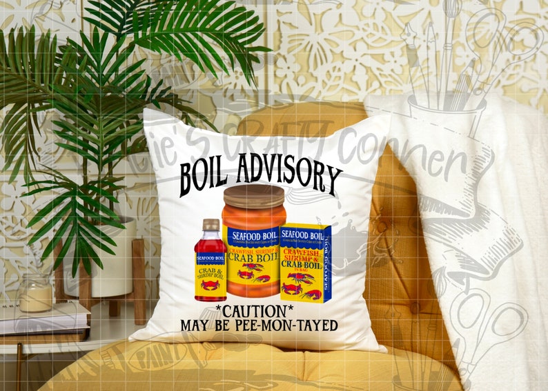 May include: White pillow with the text "BOIL ADVISORY" and images of crab boil seasoning jars. The text "*CAUTION* MAY BE PEE-MON-TAYED" is below the jars.