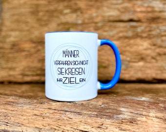 Ceramic mug with saying Men don't get lost, they circle their goal