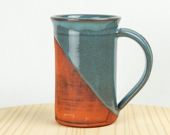 The All Day Mug in Emerald, Charcoal, Midnight, Snow, Sky, Brick, Desert Peach. Wheel thrown ceramics. 16oz mug. Red stoneware clay.