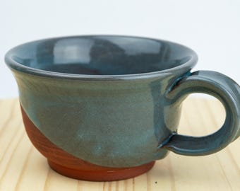 The Cappuccino Mug in Emerald. Wheel thrown pottery. Hand glazed on red stoneware clay.