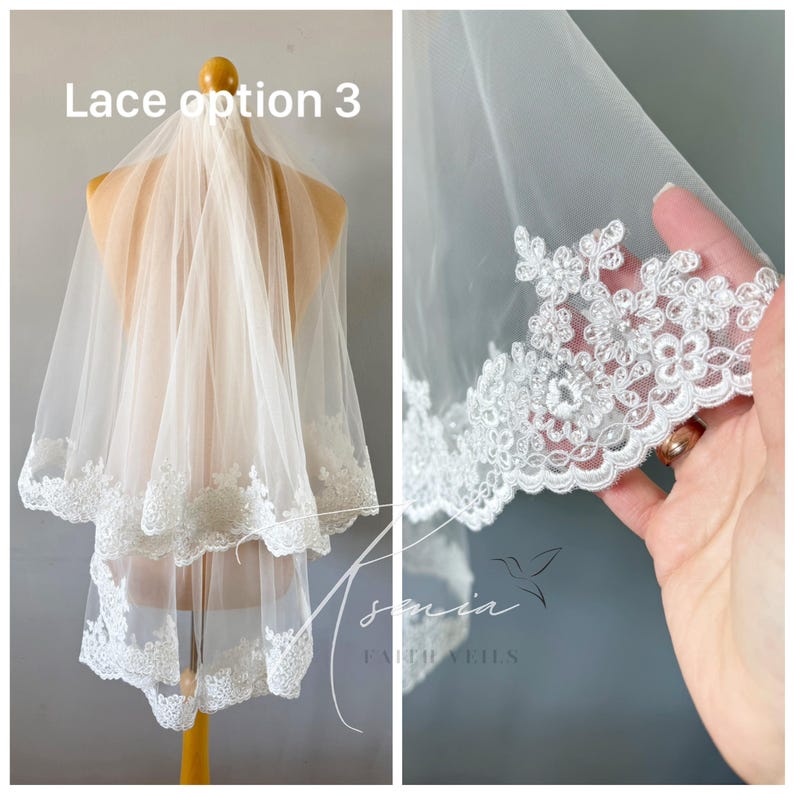 May include: A two-tiered white bridal veil with delicate floral lace trim. The veil is displayed on a mannequin, showcasing the soft, flowing fabric and intricate lace detailing. The text "Lace option 3" is visible.