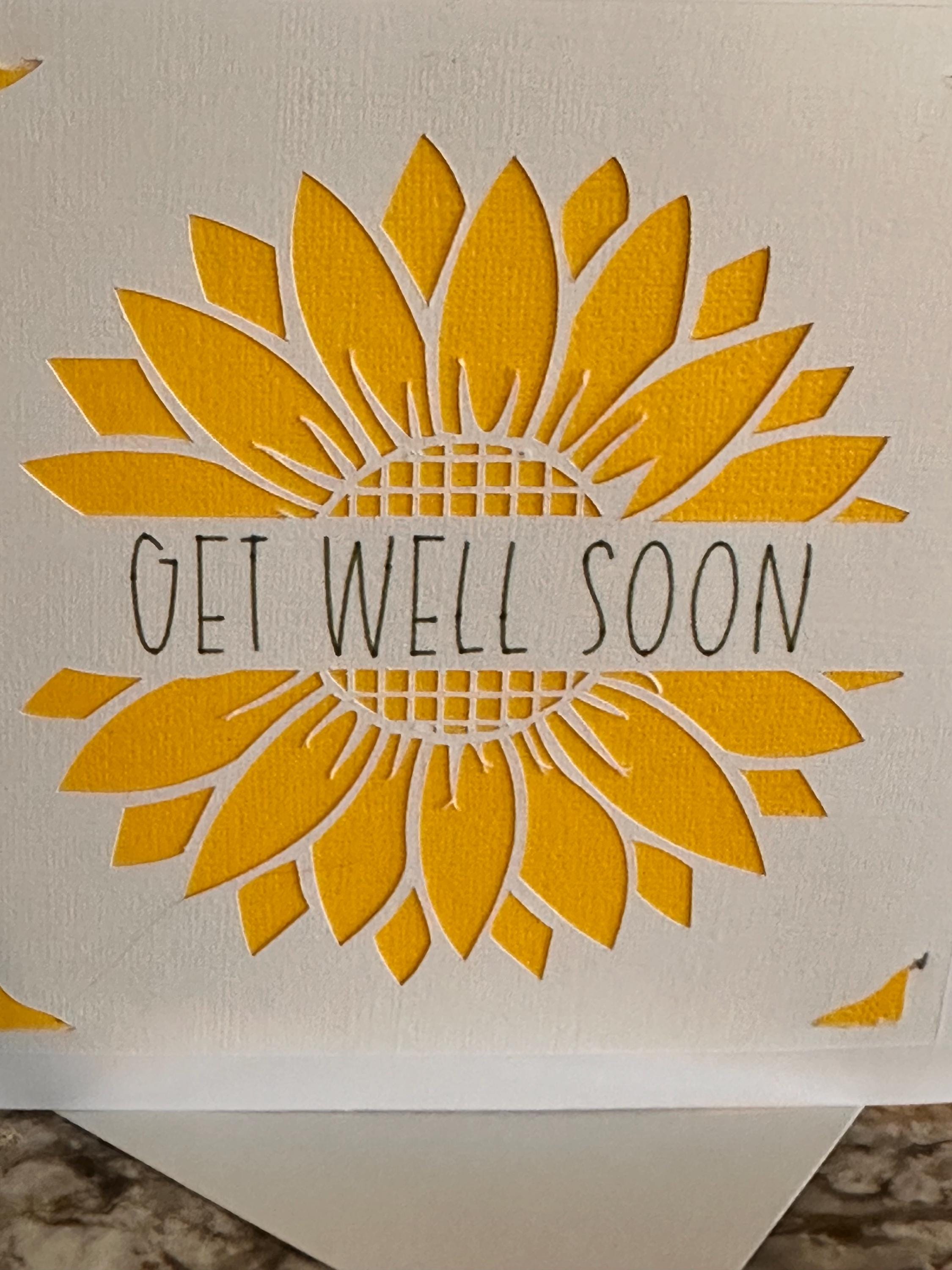 Handmade Get Well Card. 6 x 6 inch square card. Bright yellow cut out sunflower. Get Well Soon Sentiment. Blank inside for your message.