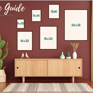 May include: A size guide for prints with different sizes displayed on a wall in a room with a wooden cabinet and a cactus plant. The sizes are 8x10, 11x14, 12x16, 16x20, 18x24, and 24x32 inches.