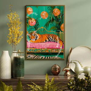 May include: A colourful illustration of a tiger sleeping on a pink and gold bed with a green background. The tiger is surrounded by disco balls hanging from the ceiling.